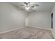 Bright bedroom with ceiling fan and carpet at 2318 Andrews Valley Dr, Kissimmee, FL 34758