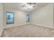 Spacious bedroom with ceiling fan and carpet at 2318 Andrews Valley Dr, Kissimmee, FL 34758