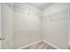 Large walk-in closet with wire shelving and carpet at 2318 Andrews Valley Dr, Kissimmee, FL 34758