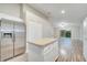 Open concept kitchen with stainless steel appliances and island at 2318 Andrews Valley Dr, Kissimmee, FL 34758