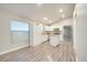 Spacious kitchen with white cabinets and an island at 2318 Andrews Valley Dr, Kissimmee, FL 34758