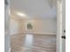 Spacious living room with wood-look floors at 2318 Andrews Valley Dr, Kissimmee, FL 34758