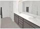 Bathroom with a double sink vanity at 2587 Summer Star Way, Leesburg, FL 34748