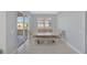 Bright dining room with tile flooring and neutral color palette at 2587 Summer Star Way, Leesburg, FL 34748