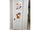 Interior door adorned with playful Lion King character decals at 2587 Summer Star Way, Leesburg, FL 34748
