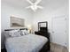 Bedroom with a queen-size bed and TV at 2948 Kokomo Loop, Haines City, FL 33844