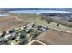 Aerial view of home by lake with surrounding area at 3610 Old Berkley Rd, Auburndale, FL 33823