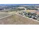 Aerial view showing home's location in open space at 3610 Old Berkley Rd, Auburndale, FL 33823