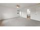 Bright bedroom featuring carpeted floors and a view of the bathroom at 3610 Old Berkley Rd, Auburndale, FL 33823