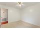 Spacious bedroom with ceiling fan and hardwood floors at 3610 Old Berkley Rd, Auburndale, FL 33823