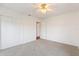 Bedroom with double closet and carpet flooring at 3610 Old Berkley Rd, Auburndale, FL 33823
