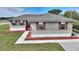 House exterior with red shutters and walkway at 3610 Old Berkley Rd, Auburndale, FL 33823