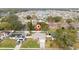 Aerial view of property showcasing location, mature trees, and proximity to neighboring houses at 3618 Willow Lake Ct, St Cloud, FL 34769