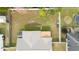 Aerial view of a spacious, fenced backyard, with an adjacent deck, offering privacy and outdoor enjoyment at 3618 Willow Lake Ct, St Cloud, FL 34769