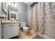 Clean bathroom with shower/tub combo and white vanity at 3618 Willow Lake Ct, St Cloud, FL 34769