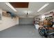 Spacious garage with ample storage space and a functional garage door at 3618 Willow Lake Ct, St Cloud, FL 34769