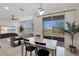 Casual dining area with sliding glass doors to backyard at 3865 Prairie Reserve Blvd, Orlando, FL 32824