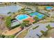 Community pool, tennis, and basketball courts at 4364 Fox Glen Loop, Kissimmee, FL 34746