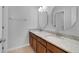 Bathroom boasts double sinks, granite countertops, and modern fixtures at 4364 Fox Glen Loop, Kissimmee, FL 34746