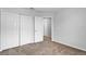Bright bedroom with ample closet space and neutral carpeting at 4364 Fox Glen Loop, Kissimmee, FL 34746