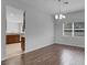 Dining room features wood-look tile floors and kitchen access at 4364 Fox Glen Loop, Kissimmee, FL 34746