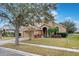 Two-story home with landscaped yard and attached garage at 4364 Fox Glen Loop, Kissimmee, FL 34746