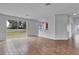 Living room with sliding glass doors and backyard access at 4364 Fox Glen Loop, Kissimmee, FL 34746