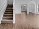 Modern staircase leading to upper level with tile floors at 4364 Fox Glen Loop, Kissimmee, FL 34746