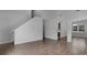 Elegant staircase with carpeted steps and tile flooring at 4364 Fox Glen Loop, Kissimmee, FL 34746