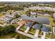 Aerial view of a house on a residential street near a lake at 540 E 19Th St, St Cloud, FL 34769