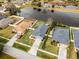 Aerial view of a house next to a lake at 540 E 19Th St, St Cloud, FL 34769
