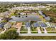 Aerial view of a house on a residential street near a lake at 540 E 19Th St, St Cloud, FL 34769