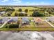 Aerial view of a house with a backyard near a pond at 540 E 19Th St, St Cloud, FL 34769