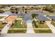 Aerial view of a house on a residential street near a lake at 540 E 19Th St, St Cloud, FL 34769
