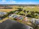 Aerial view of a house with a backyard and a pond at 540 E 19Th St, St Cloud, FL 34769