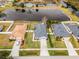 Aerial view of a house next to a lake at 540 E 19Th St, St Cloud, FL 34769
