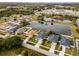 Wide aerial view of houses near a lake at 540 E 19Th St, St Cloud, FL 34769