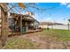 Spacious backyard with deck, pergola, and lush grass at 540 E 19Th St, St Cloud, FL 34769
