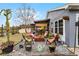 Relaxing backyard patio with red chairs and fire pit at 540 E 19Th St, St Cloud, FL 34769