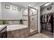 Bathroom boasts a soaking tub, walk-in shower, and ample closet space at 540 E 19Th St, St Cloud, FL 34769