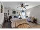 Main bedroom with large bed, dresser, and ceiling fan at 540 E 19Th St, St Cloud, FL 34769