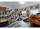 Playful bedroom with built in shelving and window seat at 540 E 19Th St, St Cloud, FL 34769