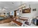 Farmhouse style dining area with rustic wood table and bench seating at 540 E 19Th St, St Cloud, FL 34769