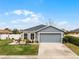 Charming one-story home with gray siding and stone accents at 540 E 19Th St, St Cloud, FL 34769
