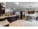 Open concept kitchen and dining area with a sliding barn door at 540 E 19Th St, St Cloud, FL 34769