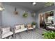 Bright sunroom features a workspace and access to the backyard at 540 E 19Th St, St Cloud, FL 34769
