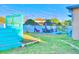Landscaped backyard with gazebo and patio furniture at 570 Bristol Cir, Kissimmee, FL 34758
