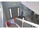 Inviting entryway with staircase, and view into living room at 570 Bristol Cir, Kissimmee, FL 34758