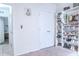 Bright bedroom with a custom closet system that allows storage for accessories, clothing, and shoes at 6144 Forest Ridge Way, Winter Haven, FL 33881
