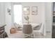 Cozy dining area featuring a round table with four chairs and modern decor at 6144 Forest Ridge Way, Winter Haven, FL 33881